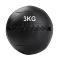 Black wall ball with '3KG' marking on a white background