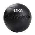 Black wall ball with '9KG' marking on a white background