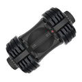 Black cylindrical device with multiple knobs on a white background