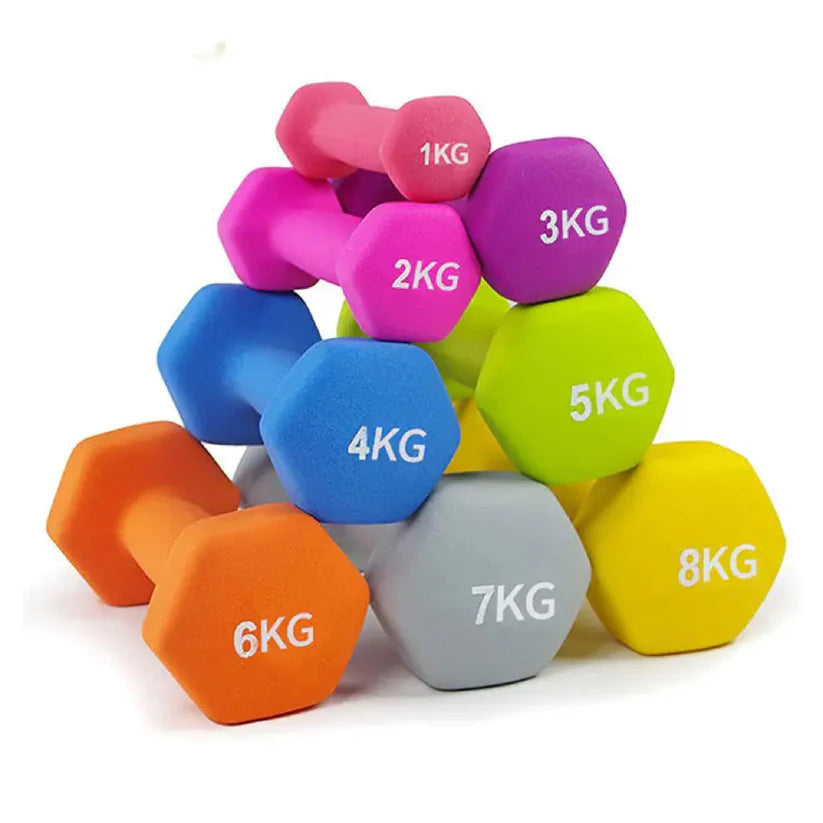 Colorful set of dumbbells with weight markings on a white background