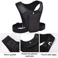 Black tactical vest with multiple pockets on a white background
