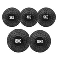 Set of five black weighted balls with labeled weights on a white background