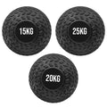 Three black textured exercise balls with weight labels on a white background