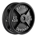 Two black weight plates with measurement labels on a white background