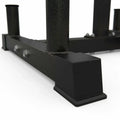 Black metal stand with multiple posts on a white background